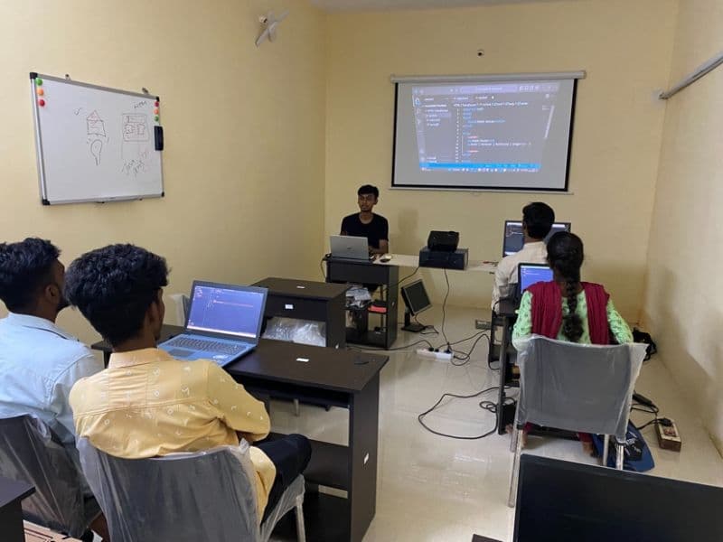 Agnel teaching one of his first classes in a rented classroom